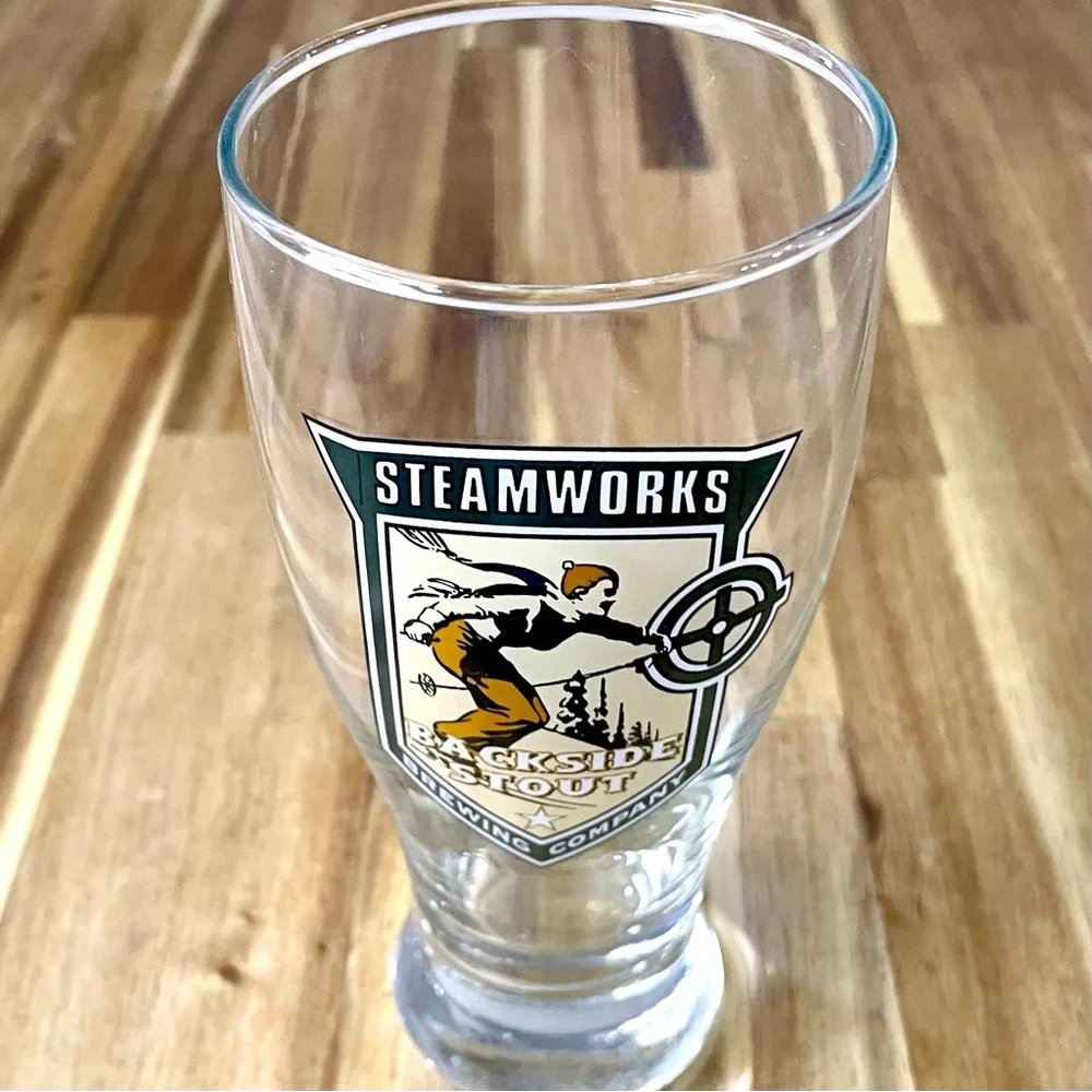 Steamworks Brewing Company Beer Glass 6 1/2” Skier Logo Retro Pilsner Glass
